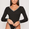 Brionie - Aztec Trim Black Fine Knit Long Sleeve Bodysuit